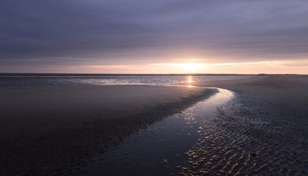 sunset on beach in the UK