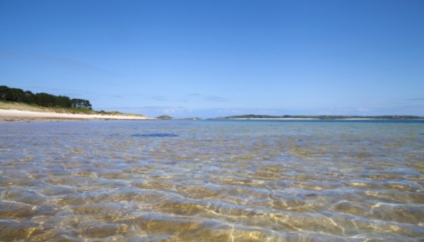 clear water at a beautiful beach in the Isles of Scilly