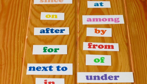 Prepositions listed out on a table which is a common grammar error in english