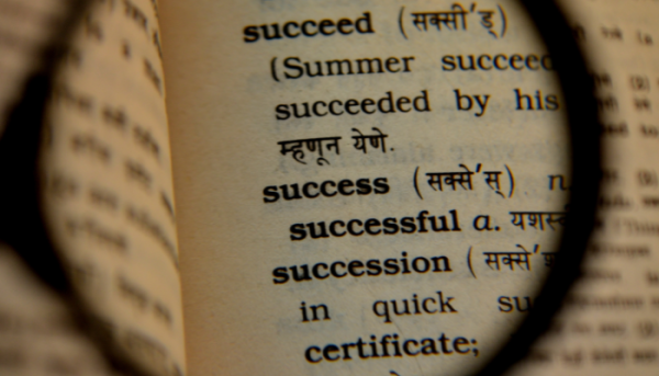 a dictionary with the word success highlighted