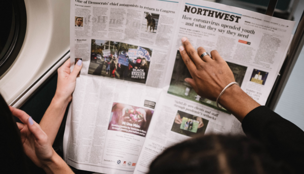 reading a newspaper can be a quick way to learn english on your way to school