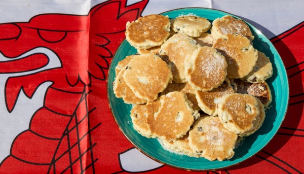 Traditional welsh cakes sat on top of the dragon on the welsh flag