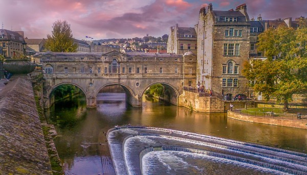 view of river in bath, england with an aquaduct