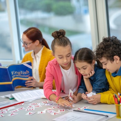 full language immersion where an english speaking teacher is teaching her students english